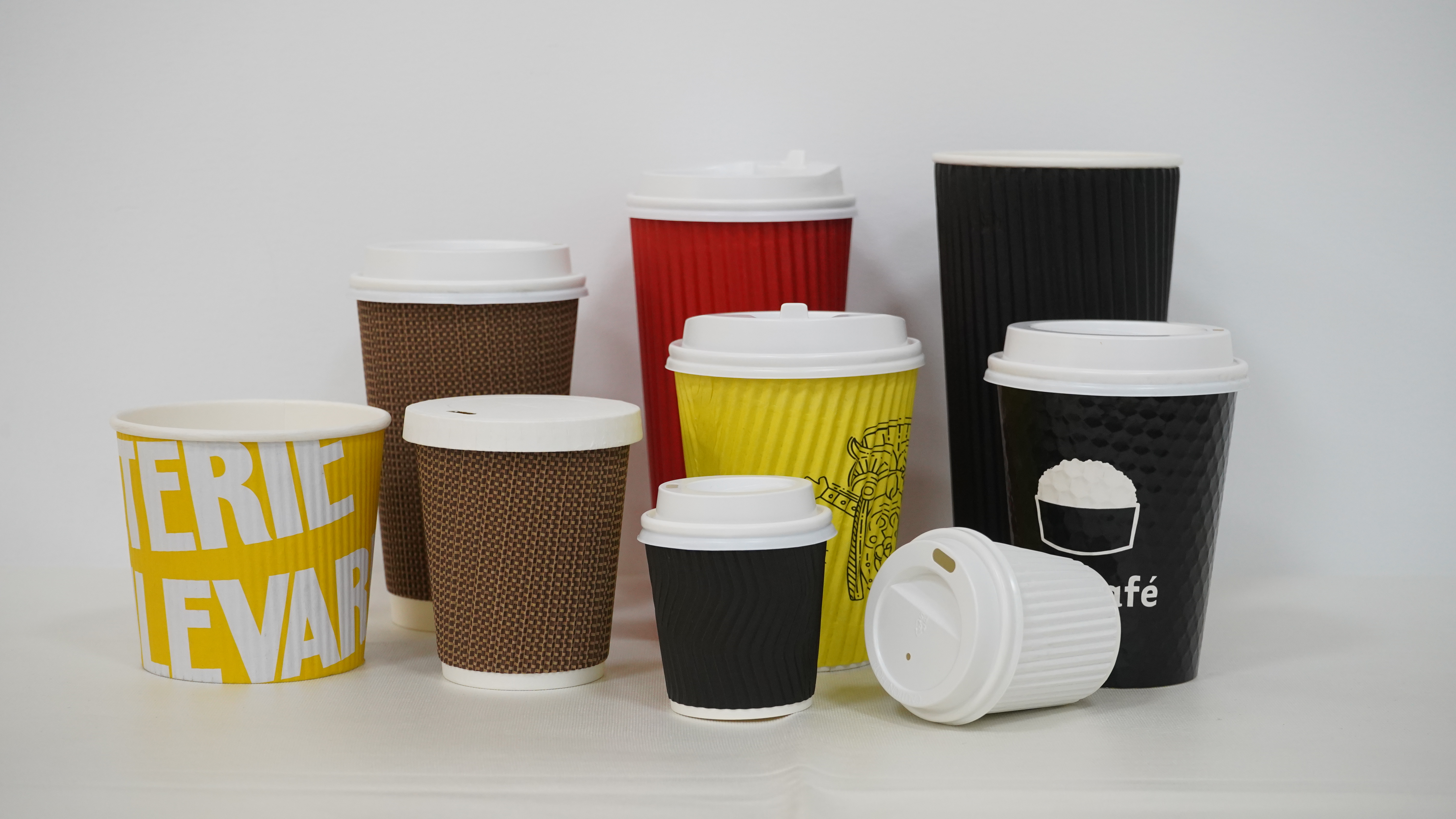 Printed paper cups in various sizes